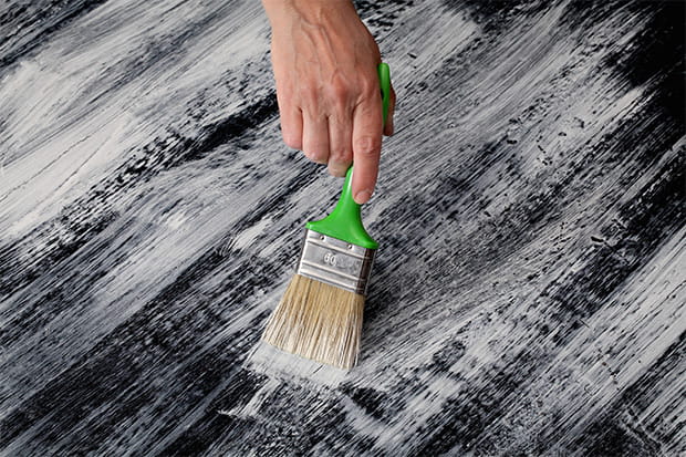 Apply the whitewash mixture evenly on your laminate floor