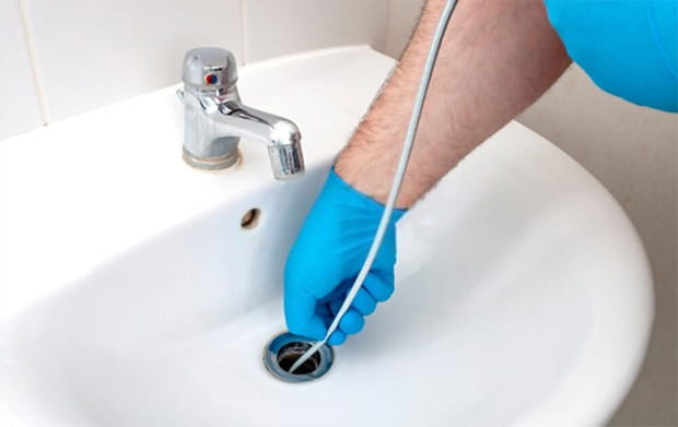 Pouring mop water into the sink can cause it to clog since there is debris inside this kind of waste