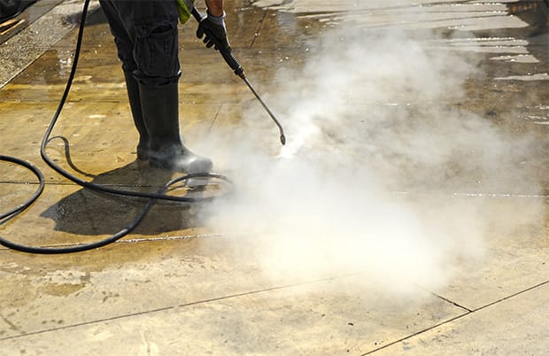 cleaning with pressurized water the pavement