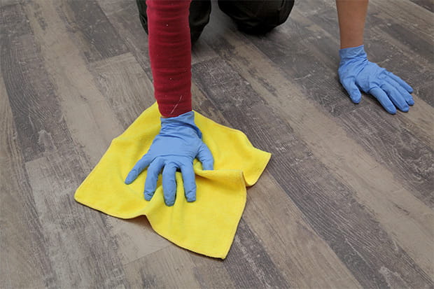 Hand in glove cleaning laminate floor