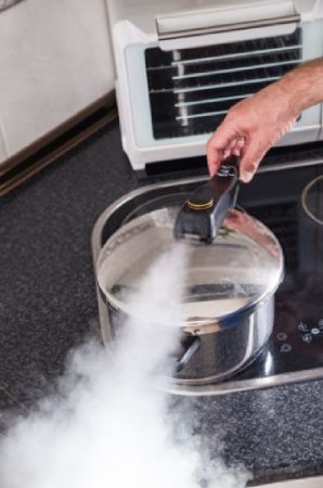 Releasing steam on the valve cooker model