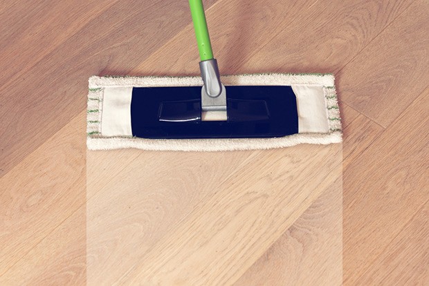 Wipe the cleaner up with a microfiber mop