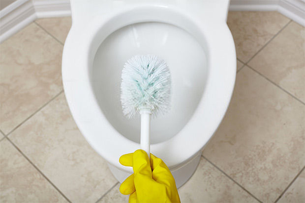 Use the toilet brush to clean after you apply the lemon cleaner
