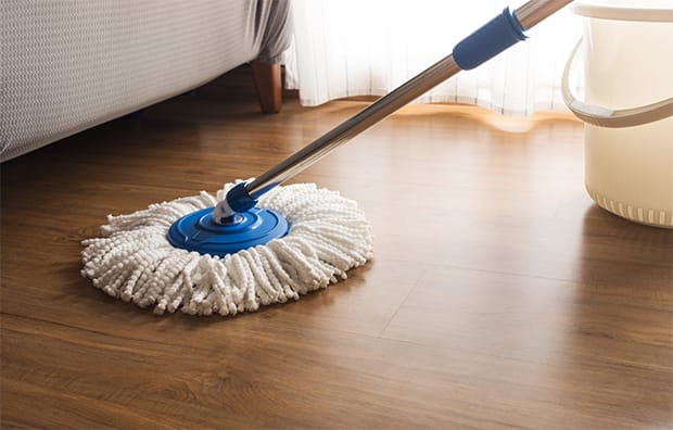 A mop is the best tool to apply Fabuloso on your vinyl floor