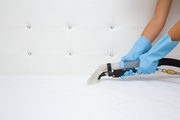 Vacuum the baking soda from your mattress to finish the cleaning