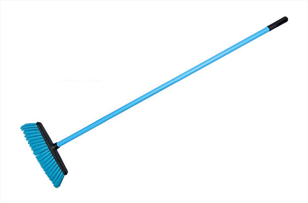 A broom handle of any kind would make the perfect tool for cleaning the hose