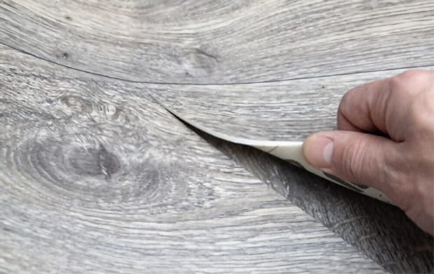 You can use your hands to remove old vinyl flooring